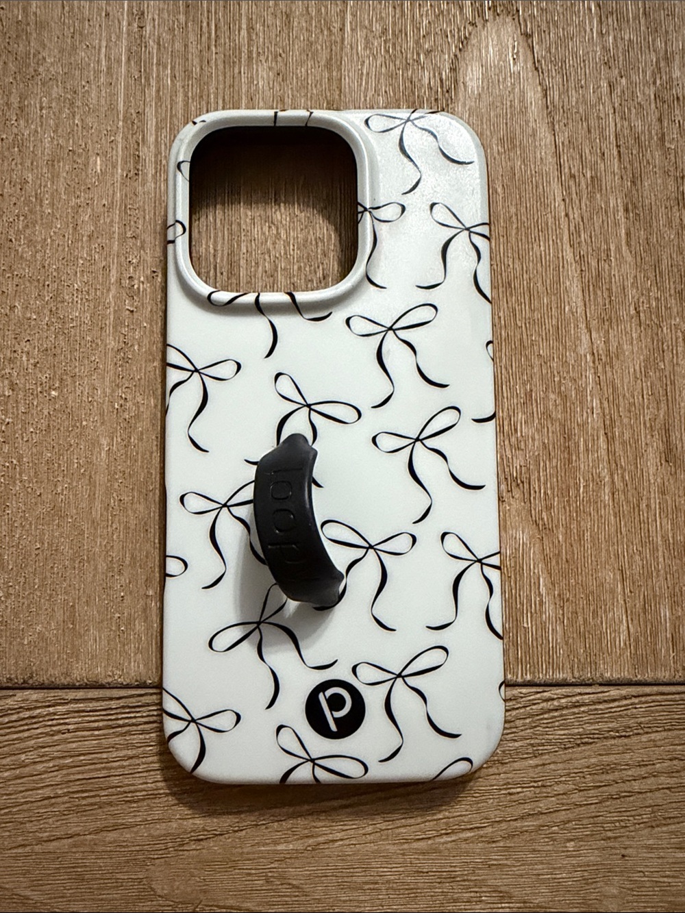LOOPY CASE - Black Bows - Apple / iPhone 16 Pro (6.3" Screen) / Righty